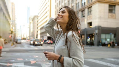 Woman smiling in city